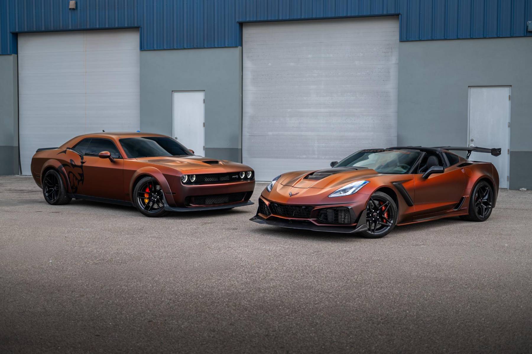 Orange-wrapped Dodge Challenger and Corvette ZR1 at Sage Auto Studios